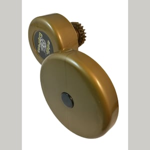 May include: Gold-colored electric motor with a black button and a gear on the side. The motor has the text "Electric" and a logo on the side.