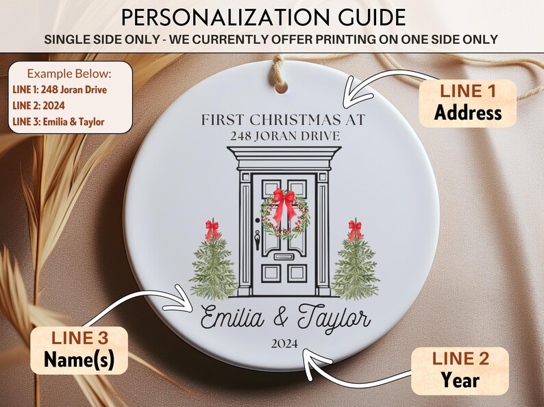 May include: White ceramic ornament with a black and white illustration of a front door with a wreath and two Christmas trees. The text "FIRST CHRISTMAS AT 248 JORAN DRIVE" is above the door. The text "Emilia & Taylor 2024" is below the door.