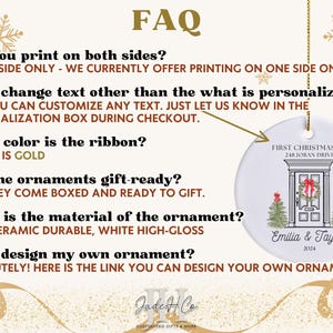 May include: A white ceramic ornament with a black and white illustration of a front door with a wreath. The ornament is personalized with the text "First Christmas at 248 Joran Drive" and "Emilia & Taylor 2024". The ornament is hanging from a gold string.