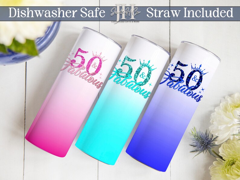 May include: Three 20 ounce stainless steel tumblers with a gradient design. The tumblers are pink, turquoise, and blue. Each tumbler has a glitter design that says "50 & Fabulous".