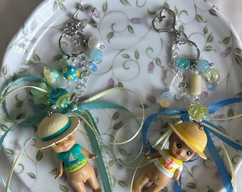Accessorized Sonny Kewpie Baby Angel Cherub Maximalist Handmade Beaded Bow Ribbon Keychains | Summer Edition