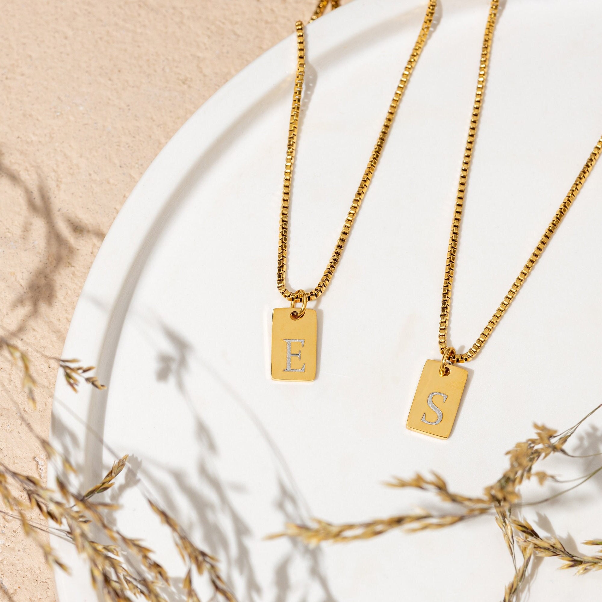 janjiTOKYO MINI TAG necklace top