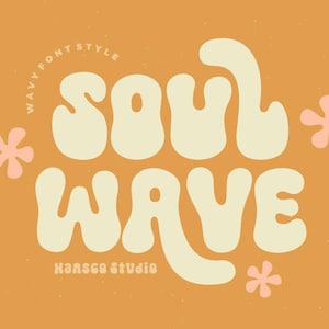 May include: A graphic design featuring the text "Soul Wave" in a wavy, retro font style. The text is in a light cream color against a light orange background. The design is decorated with pink flower shapes.