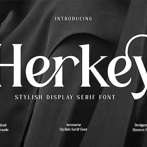 May include: A black and white image featuring the word "Herkey" in a bold, stylish serif font. The text "INTRODUCING" is above the main text, with "STYLISH DISPLAY SERIF FONT" below. Additional text includes "Original Handmade", "Awesome Stylish Serif Font", and "Designed by Hansco Studio".