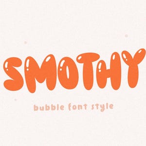 May include: The word "SMOOTHY" in a bubble font style. The letters are orange and have a glossy finish.