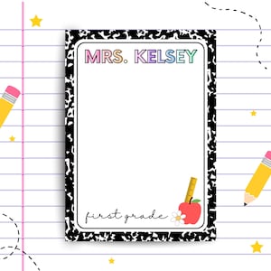 May include: A black and white notebook paper design with a white border. The text "MRS. KELSEY" is in rainbow colors at the top. The text "first grade" is handwritten at the bottom. There is a red apple with a green stem and a yellow ruler next to it.