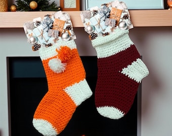 May include: Two handmade Christmas stockings. One is orange with white accents and a pom-pom, the other is burgundy with white accents. Both have decorative tops with gift and pinecone embellishments, and silver ornaments.