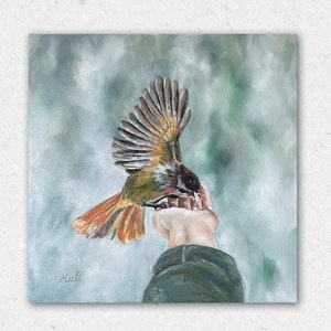 Original oil painting of a hand feeding a bird
