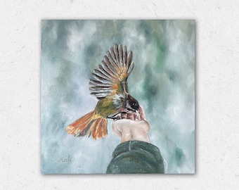 Original oil painting of a hand feeding a bird