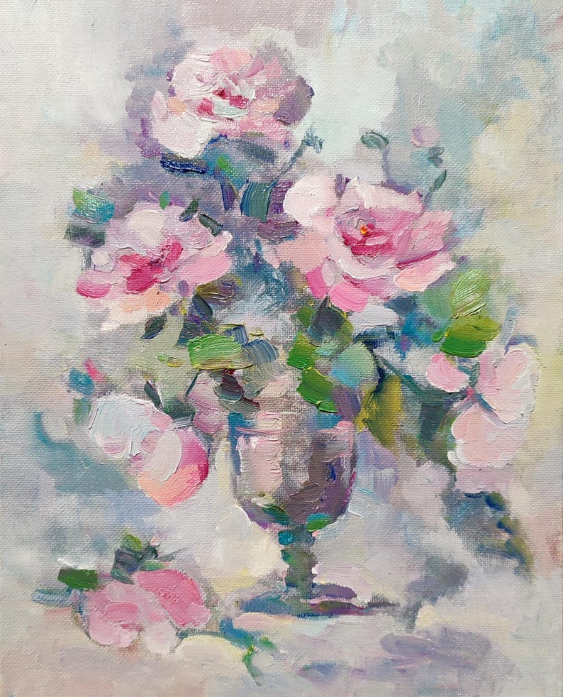 May include: A painting of a bouquet of pink roses in a clear glass vase. The roses are painted in a loose, impressionistic style, with soft edges and brushstrokes. The background is a light blue-grey.