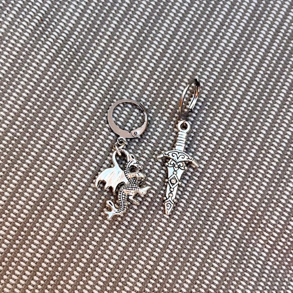 Fantasy Dragon Dagger Huggie Hoop Earrings | mismatched silver hoop earrings, dragon charm earrings, sword charm earrings, silver earrings