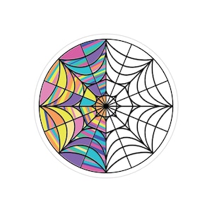May include: A round sticker featuring a colorful, abstract design. The left half is filled with vibrant, striped sections in pink, orange, yellow, purple, and blue. The right half is a black and white spiderweb design.