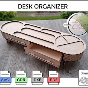 May include: A light brown wooden desk organizer with multiple compartments and a drawer. The organizer has a rounded design and is labeled "DESK ORGANIZER". The image also includes file type icons for SVG, CDR, DXF, and PDF.