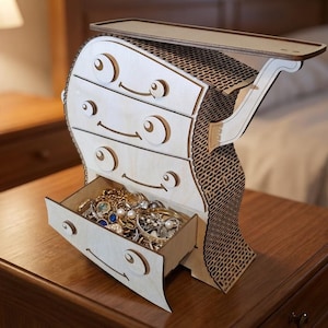 May include: A whimsical wooden jewelry box with a unique design, featuring a series of drawers and a top shelf. The box is crafted from light-colored wood and is filled with jewelry. The back of the box has a patterned design.