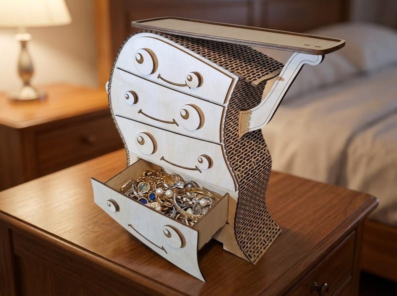 May include: A whimsical wooden jewelry box with a unique design, featuring a series of drawers and a top shelf. The box is crafted from light-colored wood and is filled with jewelry. The back of the box has a patterned design.