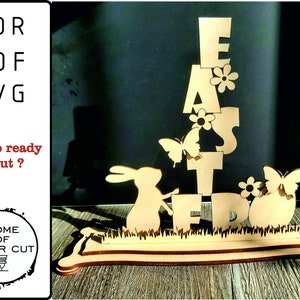 May include: Wooden Easter sign with the word "EASTER" stacked vertically. The sign features a bunny rabbit, butterflies, and flowers.