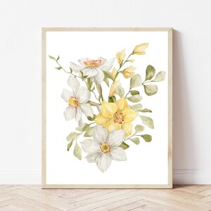 May include: A watercolour painting of a bouquet of white and yellow daffodils with green leaves. The flowers are arranged in a loose, natural style.