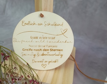 Schoolchild button made of wood with name Finally a schoolchild