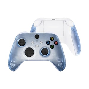May include: Two transparent blue and white game controllers. The front controller has black thumbsticks, a black directional pad, and colored buttons. The back controller is white. The controllers are on a white background.