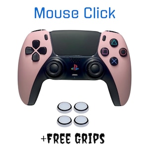 May include: A pink and black PlayStation 5 controller with four white thumbstick grips. The controller has the text "Mouse Click" above it and "FREE GRIPS" below it.