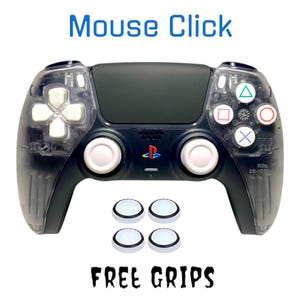May include: A clear, black, and white PlayStation 5 controller with white buttons and a black touchpad. The controller has the words "Mouse Click" printed above it and "FREE GRIPS" printed below it. The controller is accompanied by four white, round, textured grips.