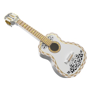 Peut inclure: Guitare acoustique blanche avec des accents décoratifs dorés et noirs. La guitare présente un motif de crâne sur la tête et le corps, avec une rosace et une touche dorées. Les bords sont ornés d'un motif de losanges dorés et beiges.