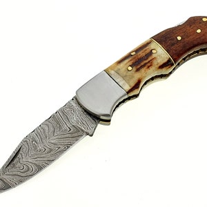 Damascus Steel Blade back lock flooding knife With Camel bon and Rose Wood