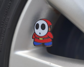 Shy Guy Tire Valve Caps: Cartoon Car Accessory - Set of 4