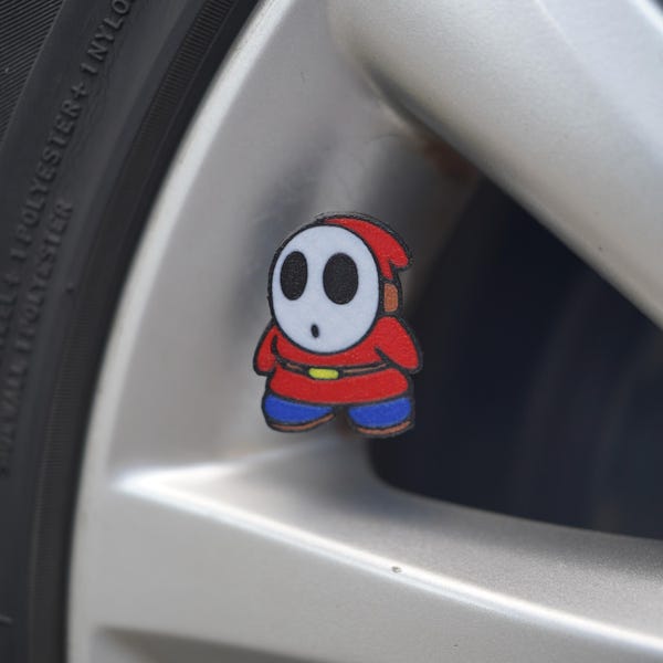 Tapones de válvula de neumático Shy Guy: Accesorio de coche de dibujos animados - Juego de 4