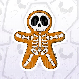 May include: A Halloween-themed sticker featuring a gingerbread man design with a skeleton motif. The gingerbread man is orange with white bone details and a skull face. The sticker has the text "Doodle Witch" on the bottom right.