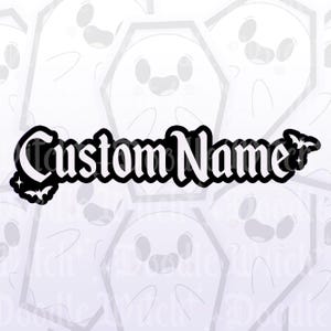 May include: A black and white sticker with the text "Custom Name" in a gothic font, adorned with bat and star accents. The background features a pattern of cartoon ghosts in coffins.