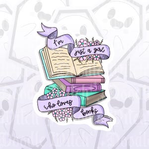 May include: A sticker featuring a stack of books with a banner that reads "I'm just a girl who loves books." The books are in pastel colors, with floral accents. The sticker has a white border and a doodle-style design.