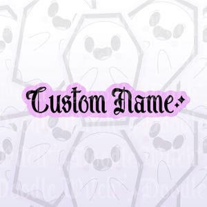 May include: A sticker with a light purple background and the words "Custom Name" in black gothic font. The sticker has a diamond shape on the right side. The background has a pattern of smiling ghost figures.