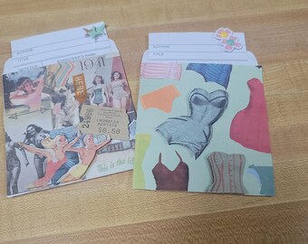 May include: Two handmade library card envelopes. One features vintage images and text including "1941" and "Umbrella Rentals $0.50". The other has cut-out images of vintage swimwear. Both have decorative embellishments.