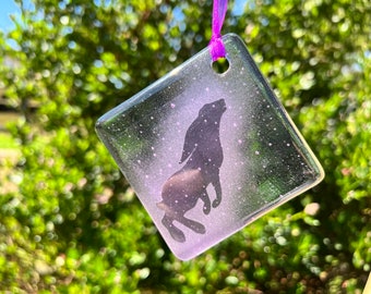 Hanging light catcher, with a hare engraved into the glass in fused glass made in Cornwall UK