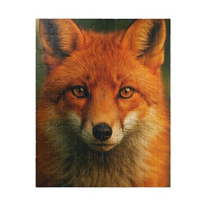 May include: A completed jigsaw puzzle depicting a close-up of a red fox's face. The fox has orange fur, a black nose, and amber eyes. The puzzle pieces are visible, and the background is a dark green.