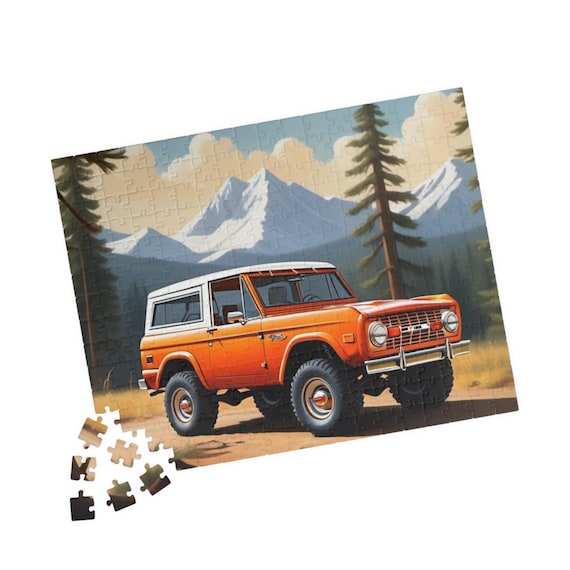 Vintage Orange 1977 Ford Bronco Puzzle | Scenic Mountain Offroad Illustration