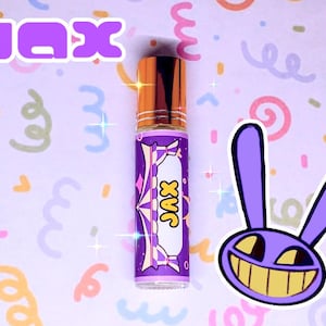 May include: A purple roll-on bottle with a gold cap, labelled "JAX" in white and purple. A cartoon rabbit with a yellow grin and purple outline is next to the bottle. The background is a light purple with colourful confetti.
