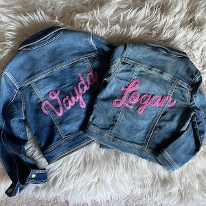 Personalized Jean Jackets with hand embroidery.
Vayda with Candy Pink felt and Lilac thread
Logan with Candy Pink felt and pink thread