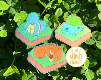 Set de pegatinas misteriosas Sleepy Starters (1 entre 3 posibilidades de brillantina)