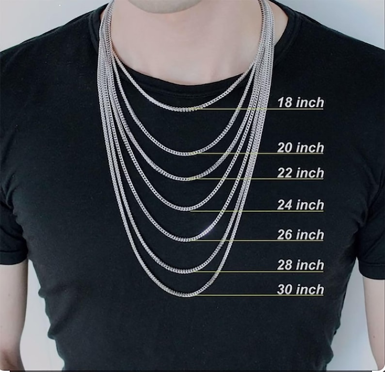 May include: A person wearing a black t-shirt with multiple silver chain necklaces of varying lengths. The necklaces range from 18 to 30 inches in length, with each length clearly labeled in white text.