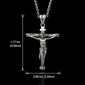 May include: Silver-toned crucifix pendant necklace. The pendant depicts Jesus on the cross, with measurements of 1.77 inches (4.50cm) in height and 0.98 inches (2.50cm) in width. The necklace has a chain and a clasp.