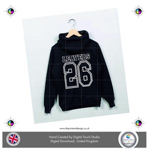 May include: Black hoodie with the word "LEAVERS" and the number "26" in white, block lettering. The sweatshirt is suspended on a wooden hanger. The website address www.dtsprintanddesign.co.uk is visible at the bottom.