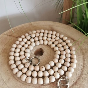 Mobile phone chain made of natural wooden beads
