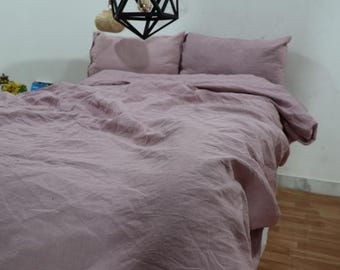 Funda nórdica de lino rosa empolvado: ropa de cama preencogida con acabado lavado a la piedra.