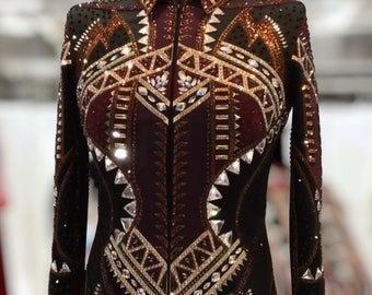 May include: A black show jacket with a maroon, gold, and white geometric pattern. The jacket is embellished with rhinestones and has a zipper closure.