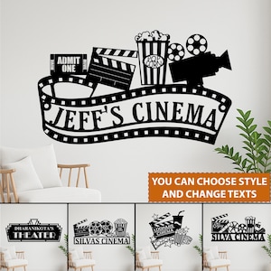 May include: Black metal cinema sign with the text "JEFF'S CINEMA". The sign features movie-themed icons like a film clapper, popcorn, film reel, and a vintage movie camera. The sign also includes the text "YOU CAN CHOOSE STYLE AND CHANGE TEXTS".