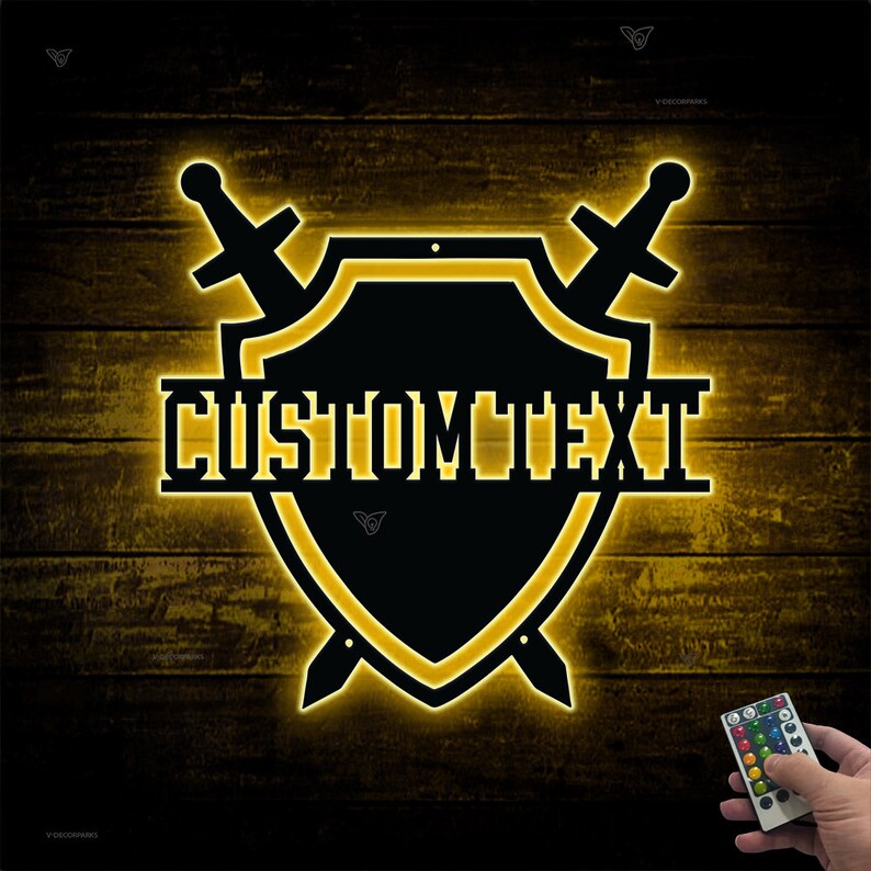 May include: A black shield with a yellow outline and two crossed swords, with the text "CUSTOM TEXT" in black letters. The shield is illuminated with a yellow glow, and the background is a dark wood grain.