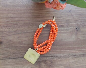 Long Necklace with Orange Czech Beads and Gold Color Metal Pendant