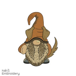 May include: Embroidered design of a brown gnome with a pointed hat, a long brown beard, and a brown tail. The gnome is wearing brown shoes.